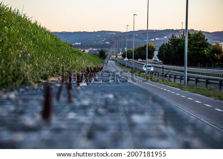 Cycle path at sundown, perspective frame, sport and free time, roads and paths, urban environment
