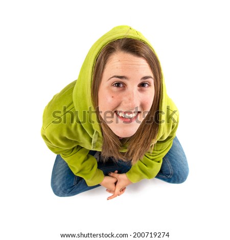 Happy young girl over isolated white background 
