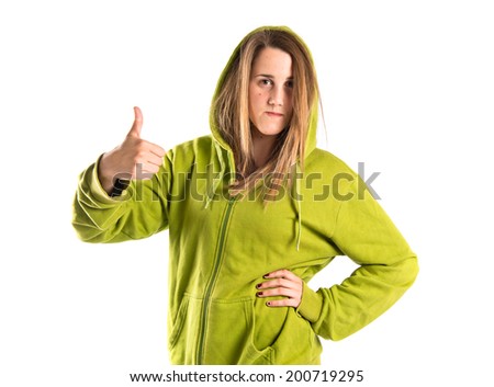Young girl making Ok sign over white background 