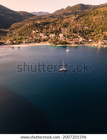 Sailing yachts in Lefkada beautiful bays at sunset