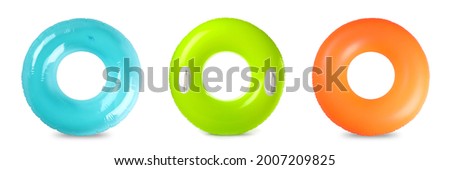 Set with colorful inflatable rings on white background, top view. Banner design Royalty-Free Stock Photo #2007209825