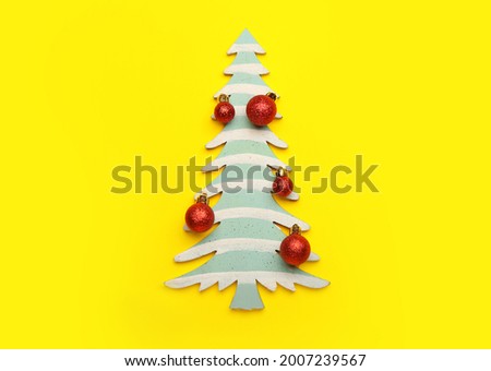 Beautiful Christmas tree on color background