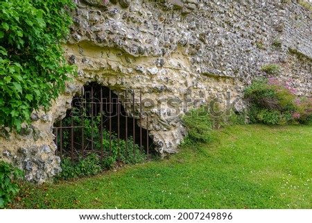 Old historic stone wall ruin with iron 