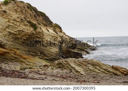 A landscape photo of rock formations at Spooner's Cove in San Luis Obispo County, California
