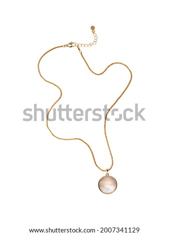 Luxury elegant golden chain with baroque pearl pendant isolated on white background. Top view Royalty-Free Stock Photo #2007341129