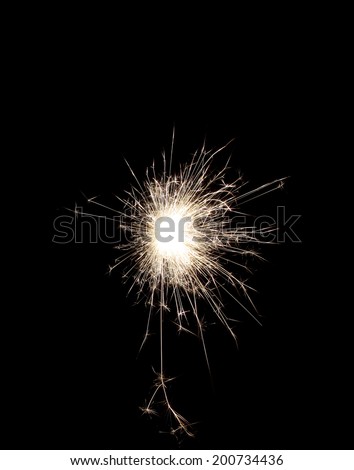 Beautiful sparkle sparklers in a circle on a black background. High resolution.