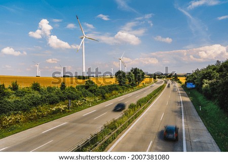 German autobahn and wind farms in the field 