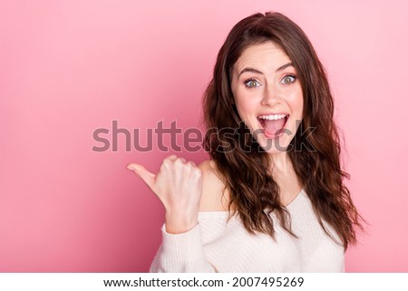 Profile side photo of young girl happy positive smile show thumb empty space ad promo advert advice isolated over pastel color background