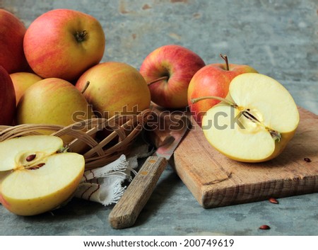 Apple cutting on wooden board in the kitchen