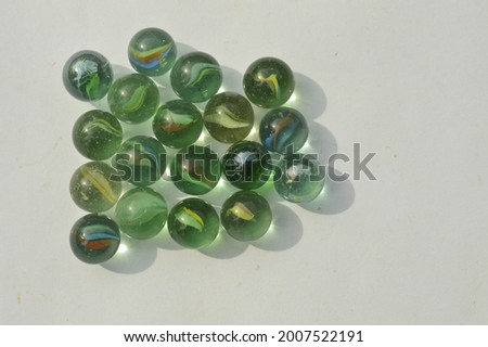Beautiful view and the colorful of marble balls, isolated on white background