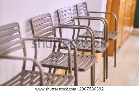 a view of  raw chair in the building.