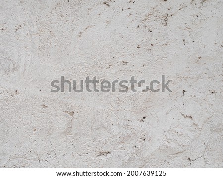 Gray concrete with plaster light painted wall monochrome background. Black and white stone house limestone fence texture. Copy space for text sign design. Architecture detail grunge textured backdrop