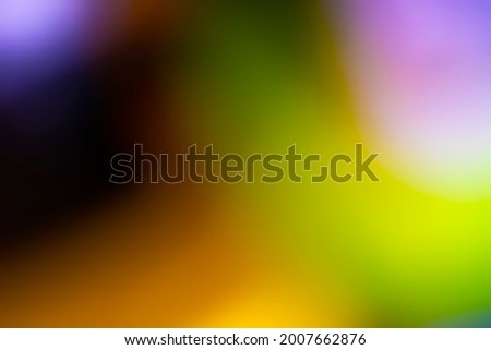 Heavily blurred multicolor background. Overlay for toning photos in festive, cheerful colors. Creation of a special out-of-focus effect.