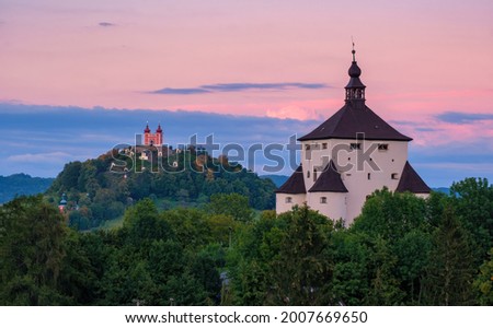 New castle and Calvary - autumn in Banska Stiavnica, Slovakia, UNESCO. Romantic sunset, a magical place of history.