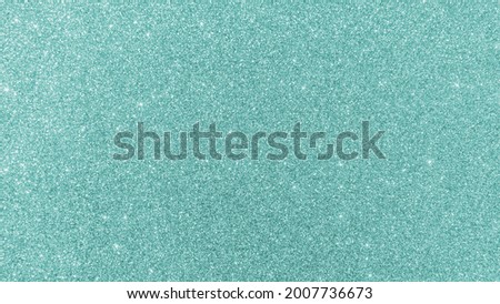Teal green glitter periwinkle blue background texture sparkling shiny wrapping paper for holiday seasonal wallpaper decoration, greeting and wedding invitation card design element Royalty-Free Stock Photo #2007736673