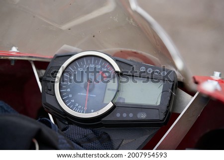 Motorcycle control panel with speedometer dashboard in motorcycle.