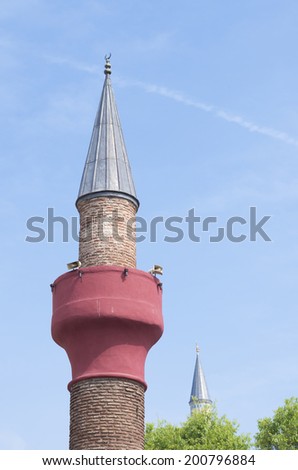 red minaret in the sultanahmet area of istanbul