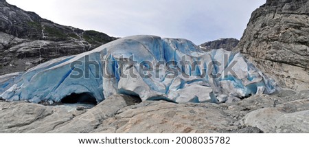 A large glacier called Jostedalsbreen in Norway, which lies between two rocks