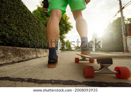 Surfskate board new activity in new normal for young people play in village street.Outdoor extreme sport for exercise.