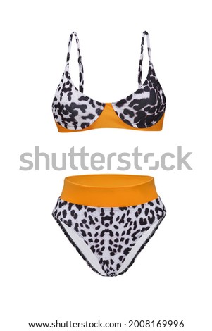 Detail shot of bright two-piece swimsuit with leopard print composed of bra with thin shoulder straps and high-waisted panties. Stylish swimming suit is isolated on the white background. Royalty-Free Stock Photo #2008169996