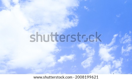 Blue summer sky, clouds. Cirrus clouds.Clear blue sky