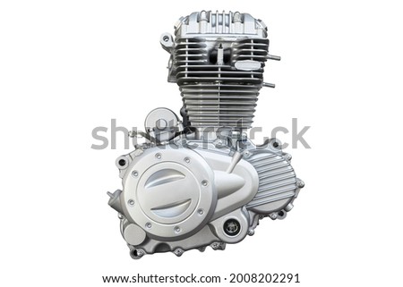 Motorcycle engine isolated on white background. Air cooled internal combustion engine for motorcycle, snowmobile or ATV.  Silver engine close up. Isolated engine