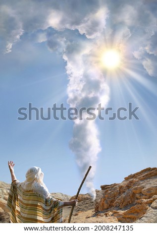 Retro holy Jesus Christ adult age egypt wise saint male human rise arm back light cloudy view. Middle east jew robe cloth Lord law torah story magic israelite hold wooden wand rod cane symbol concept Royalty-Free Stock Photo #2008247135
