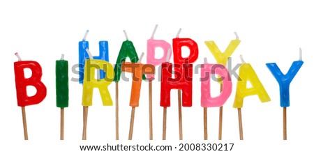 Colorful birthday candles spelling out happy birthday isolated on white background, clipping path