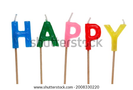 Colorful birthday candles spelling out happy isolated on white background, clipping path