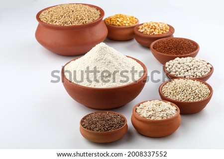 Whole wheat Atta with multigrains, soya,ragi,maize,chana,jowar,bajara,oats and flax seeds
 Royalty-Free Stock Photo #2008337552