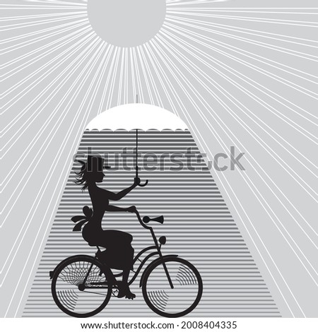 Cyclist with an umbrella on a hot day
