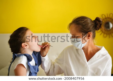 Doctor Examining Teen Girl