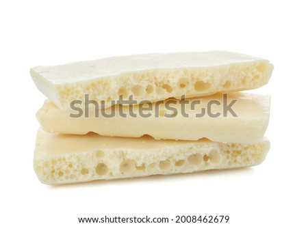 Pieces of chocolate on white background