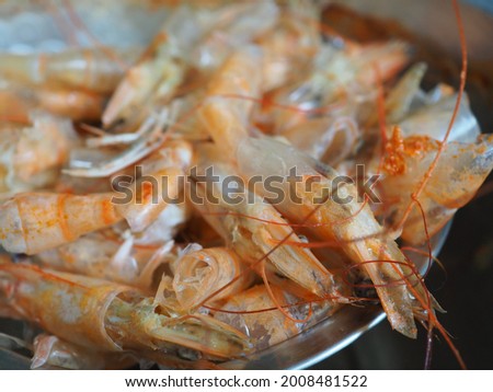 close up and selective focus oKulit Udang Rebus or the leftovers steamed skin and head for making 
 a delicious broth shrimp.