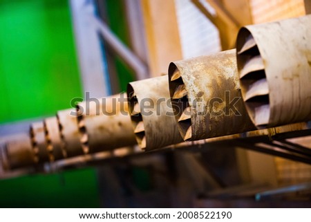 Abstract industrial vintage ventilation grid. Low depth-of-field. Close-up photo. Mining and processing plant Mechel, Kazakhstan.