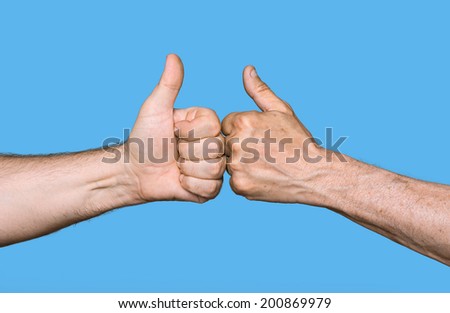 Partnership. Thumbs up sign isolated on blue