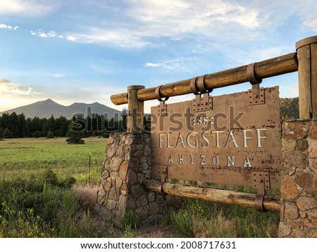 Rustic sign at the town limits of Flagstaff, Arizona Royalty-Free Stock Photo #2008717631