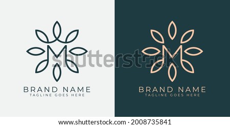M Letter with Flower logo. Vector logo template