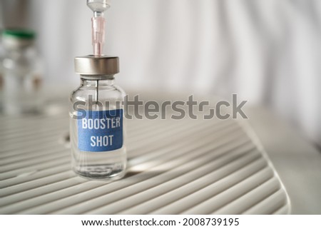 Covid-19 booster shot vaccine concept Royalty-Free Stock Photo #2008739195