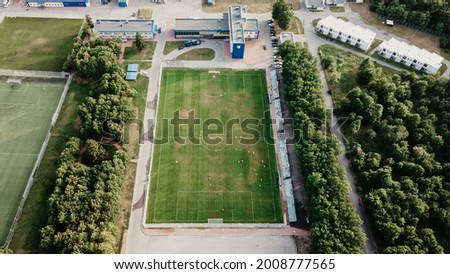 Areal view on football pitch in the forest. Football concept