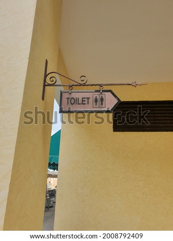 toilet sign board close up 