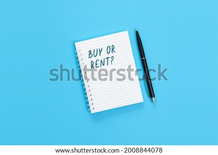 Handwritten lettering Buy or Rent? The concept of making a decision to buy or rent.
