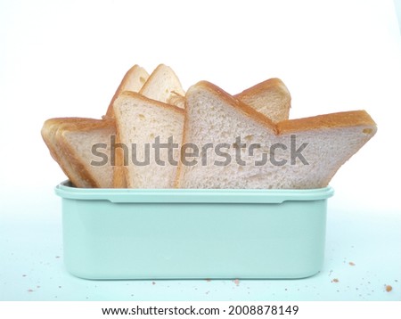 front view of sliced bread on white background closeup