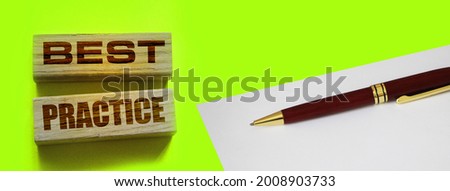 best practice words on wooden blocks on yellow. Business and healthcare concept.