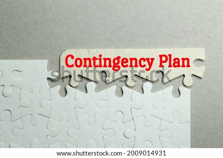 white puzzle with the word contingency plan Royalty-Free Stock Photo #2009014931