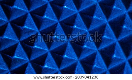 blue texture macro photo of the pyramids on tapete