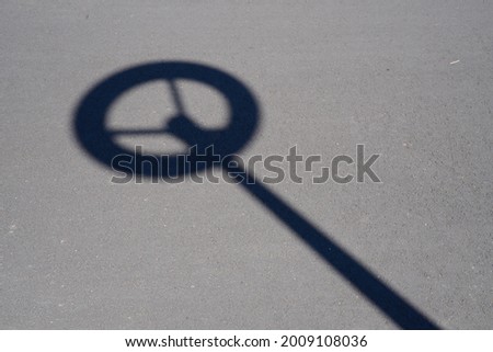 A closeup shot of the shadow of a basket for a basketball
