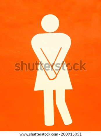 Sign of women restroom on wall background