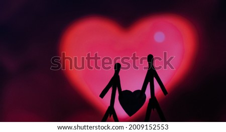 Concept of loving couples with matchsticks. Male and Female close together with beautiful heart shapes in the background. Matchstick art photography used matchsticks to create the character. Royalty-Free Stock Photo #2009152553
