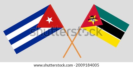 Crossed flags of Cuba and Mozambique. Official colors. Correct proportion